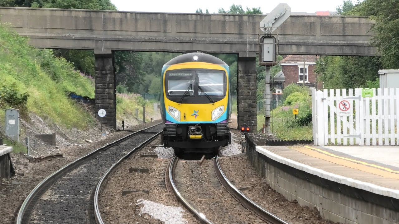 Passenger trains through Conisbrough.
