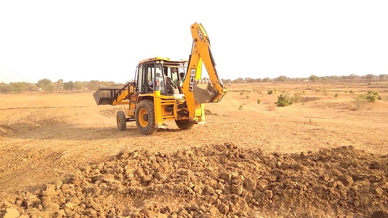JCB Backhoe Loader Filling Mud in Vehicles Foundation - JCB Machine Working For Construction 3