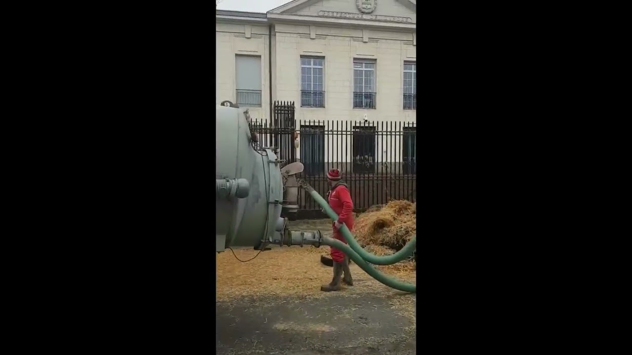 French farmers throw manure on government buildings to protest high taxes in agricultural sector!