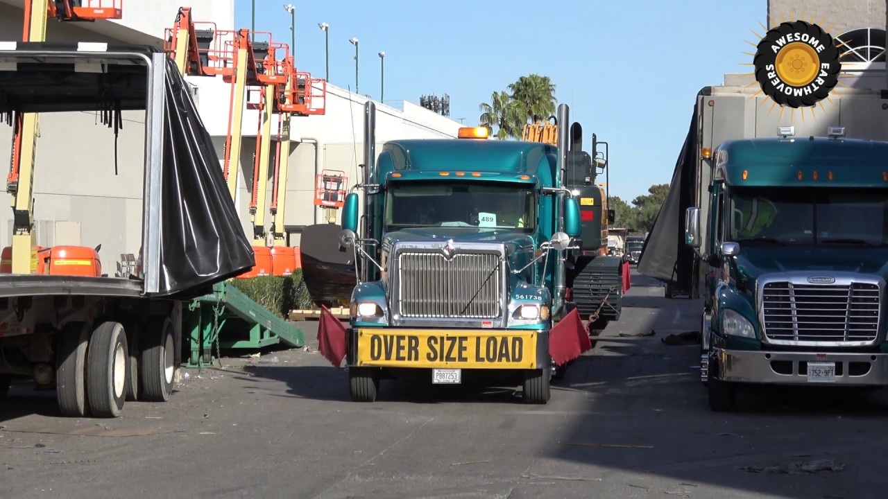 Hyundai HX480L excavator moving out of  Conexpo 2017