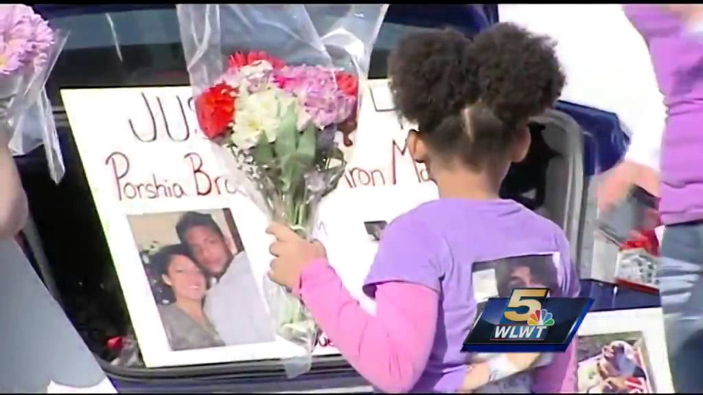 Friends, family distribute fliers for tips in woman's murder