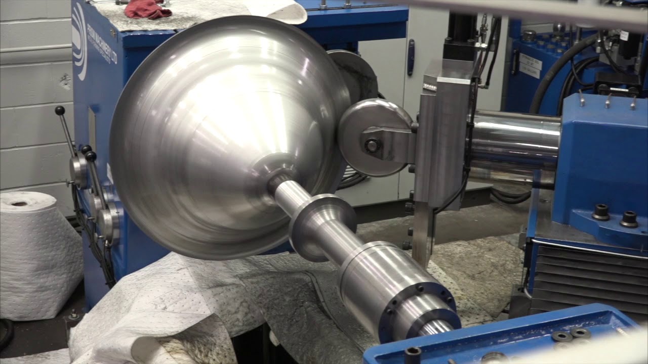 Acme Automatic CNC Spinning Machine shown spinning lighting components