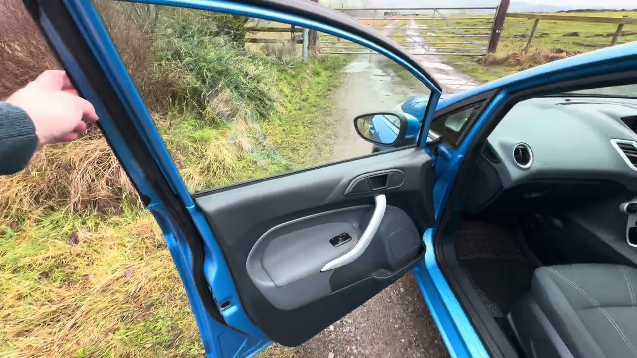 2011 Ford Fiesta Titanium in metallic blue for sale