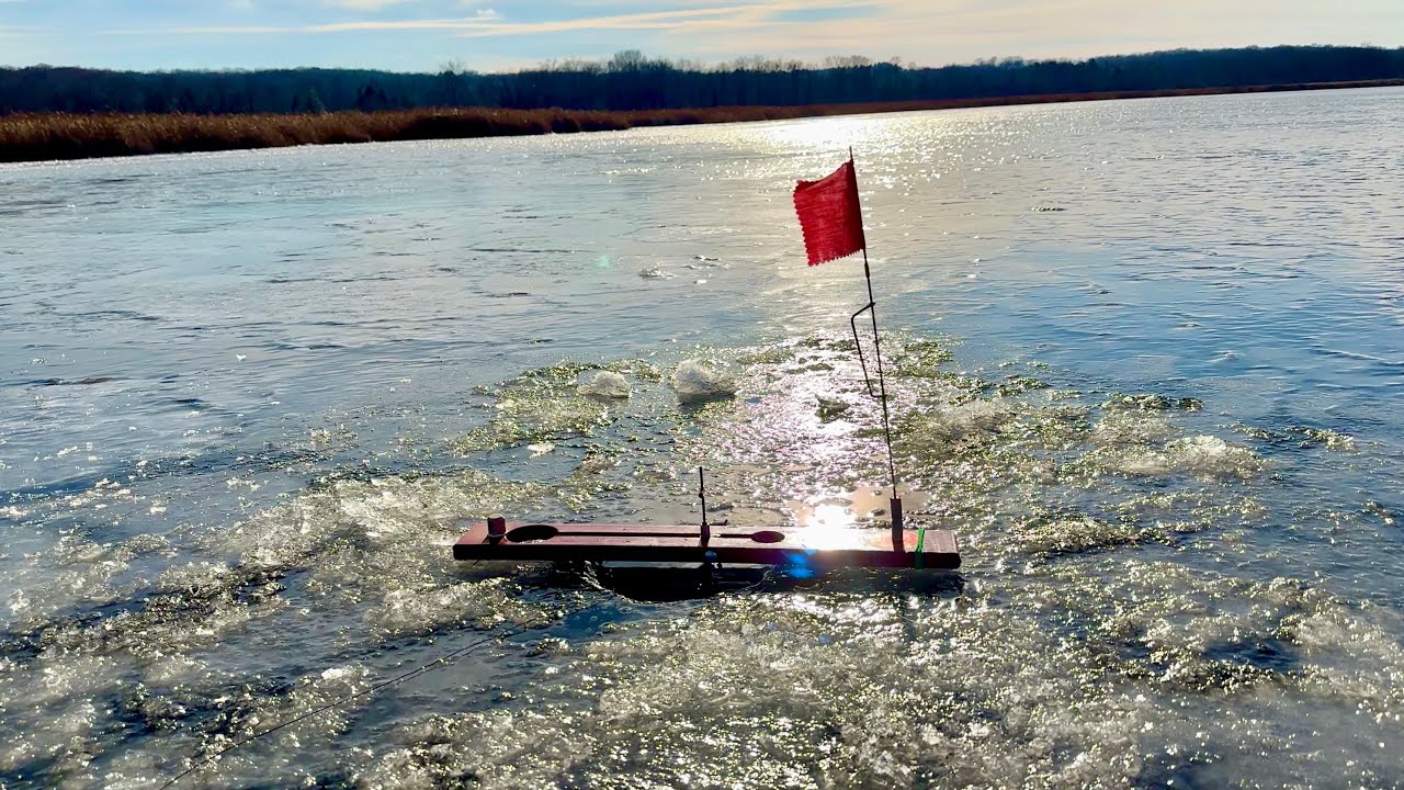 Ice Fishing with Tip Up's and Chasing Flags on FIRST ICE!