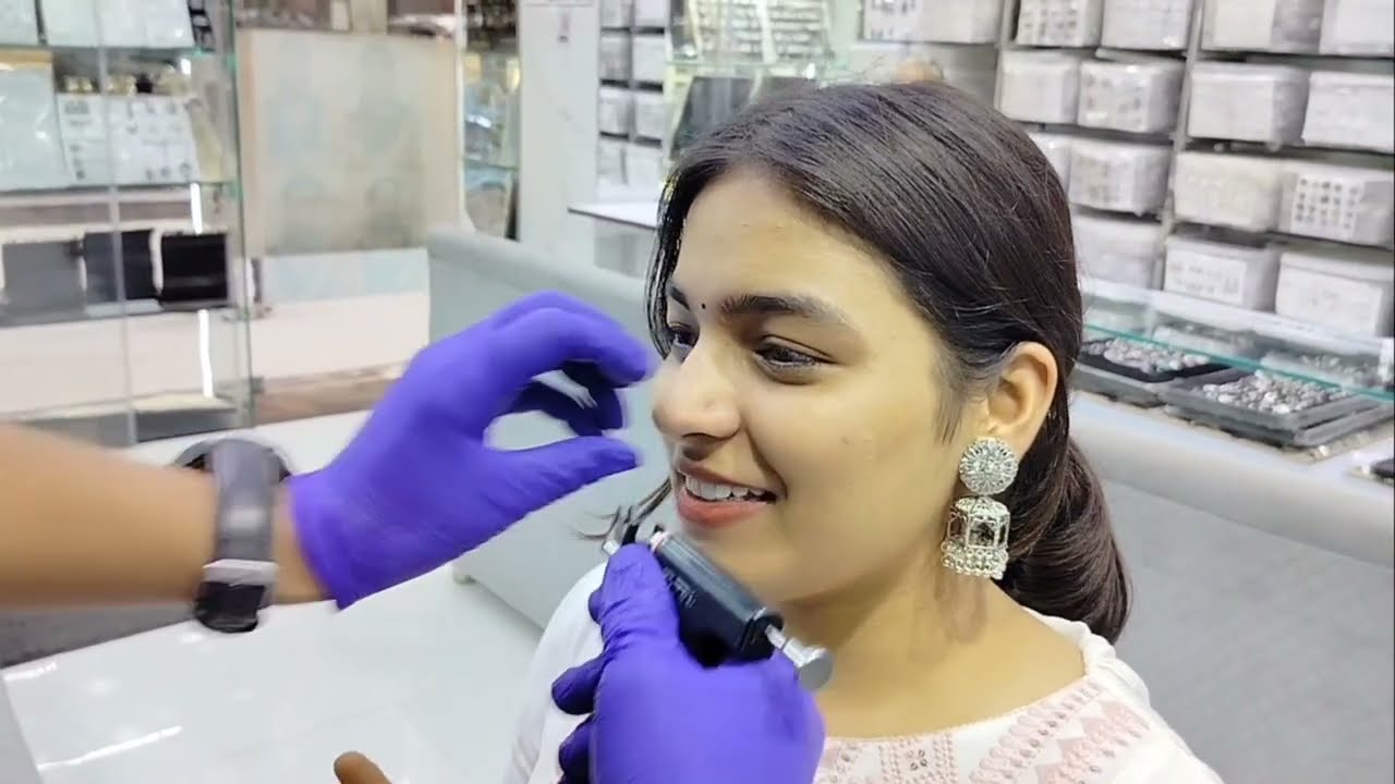 nose piercing with gun shot | painless nose piercing | raju yadav 