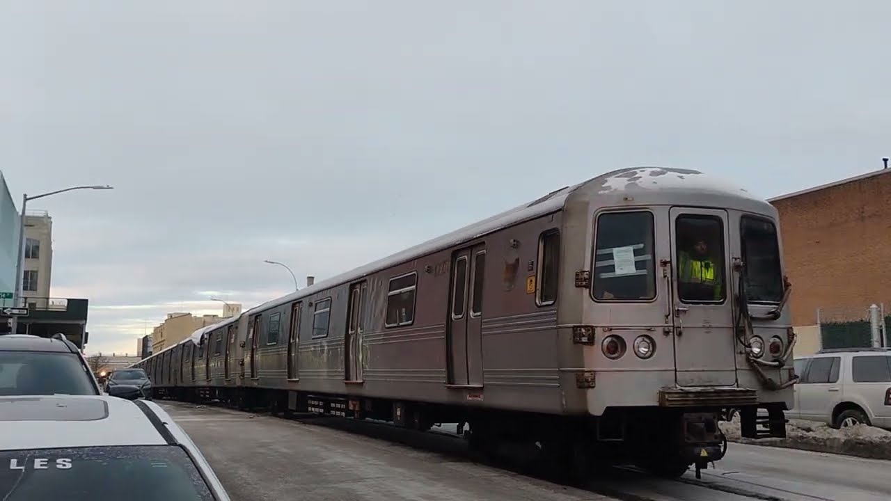 Hopper Car #212116 & Scrap R46 #6031 traveling down 1 Avenue in Brooklyn 
