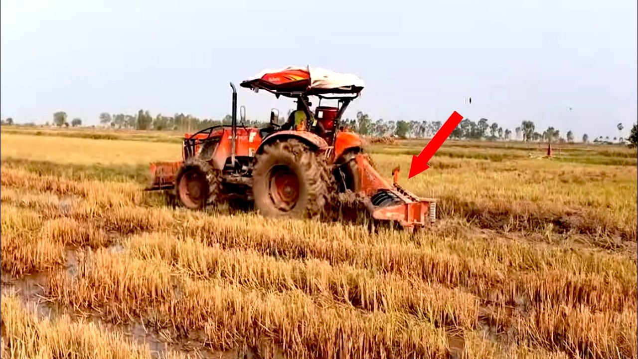 Tractor Kubota M6040 SU Plow Field Sand