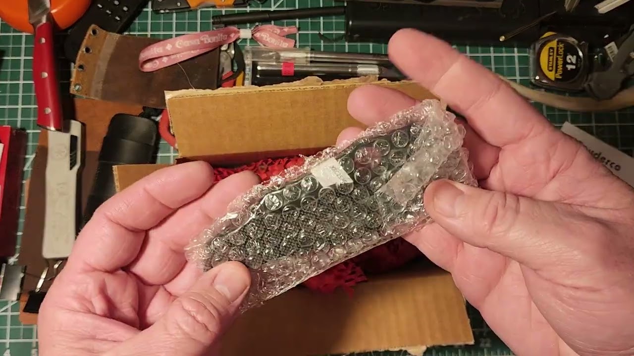 Spyderco mystery box, and extras.