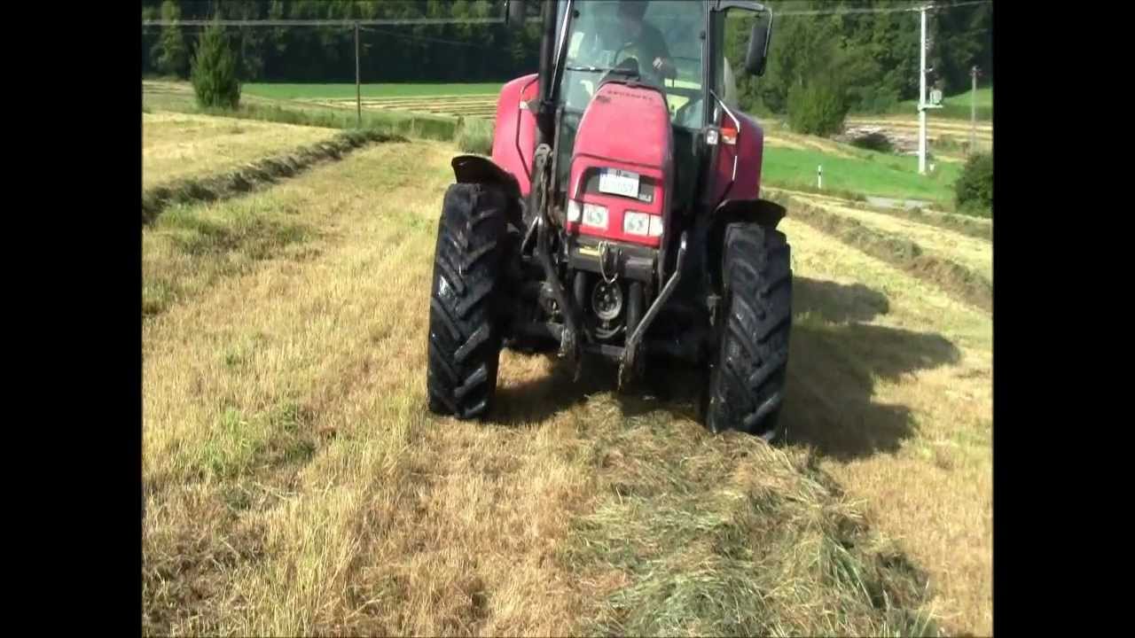 Case CS 110 und Krone Comprima F 125 XC beim Silopressen