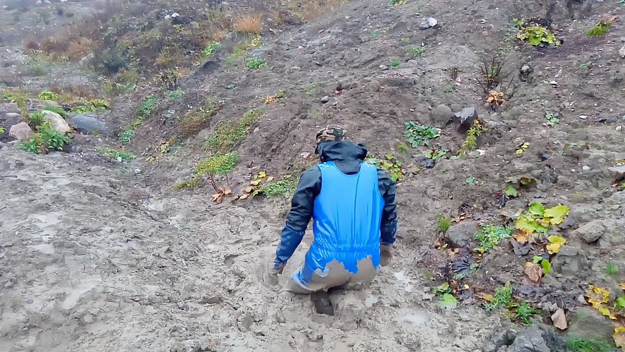 Shiny rainpants & sticky mud