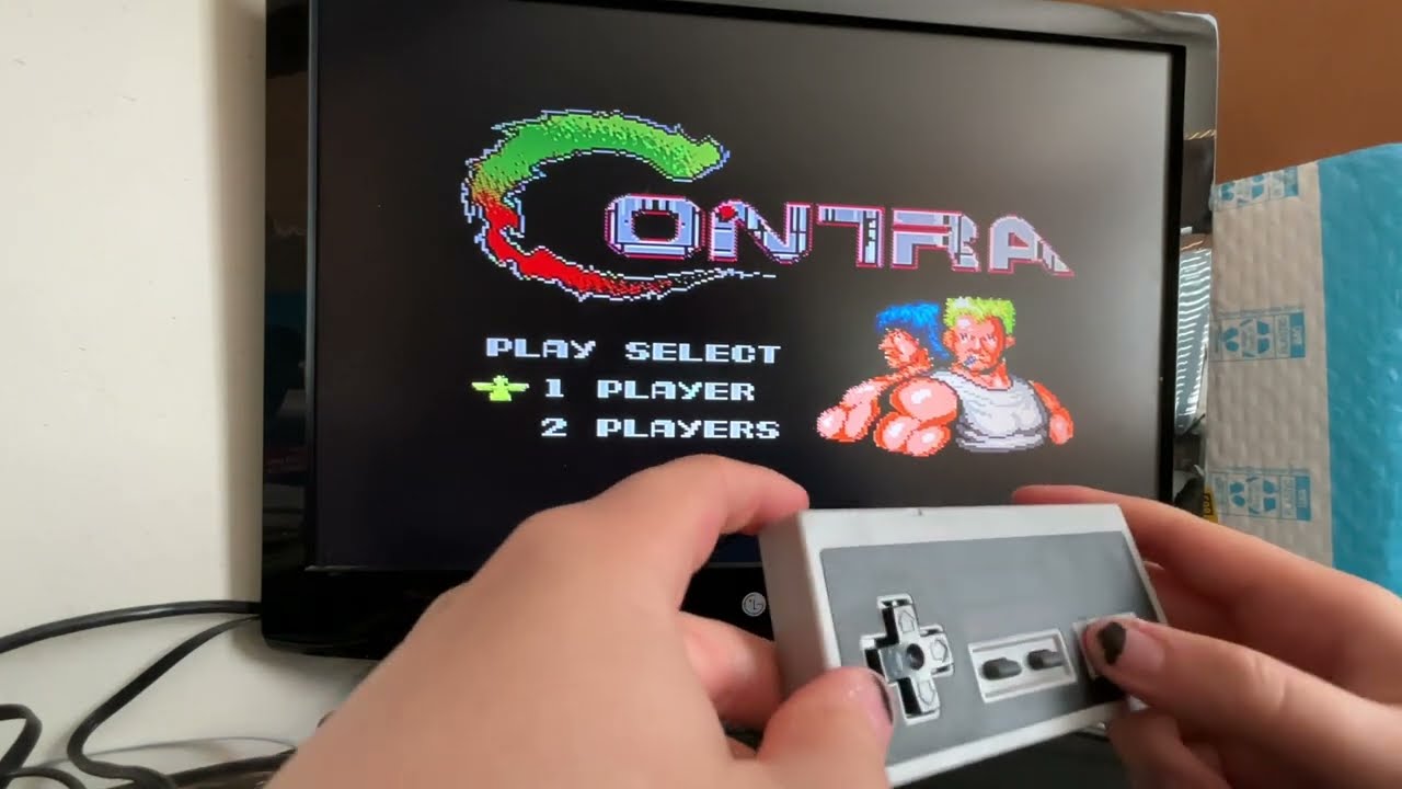 Unpacking a knock off game system and playing the first game