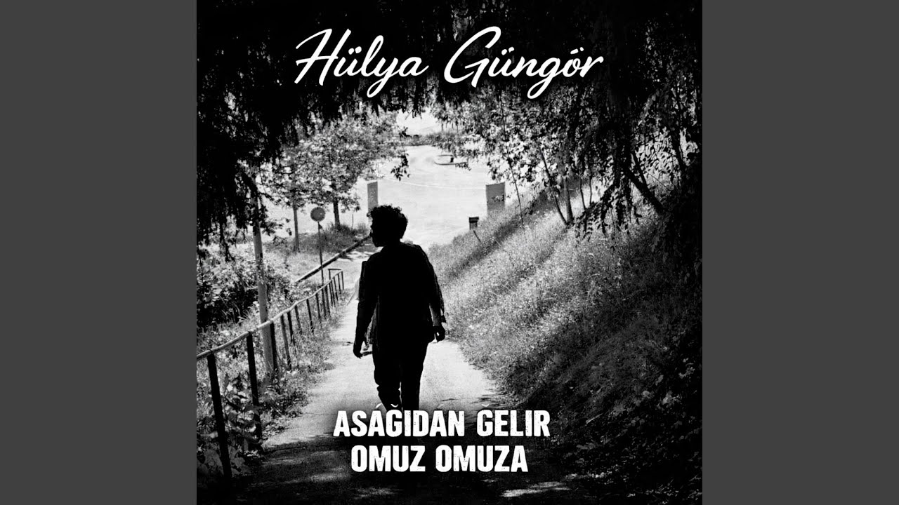 AŞAĞIDAN GELİR OMUZ OMUZA