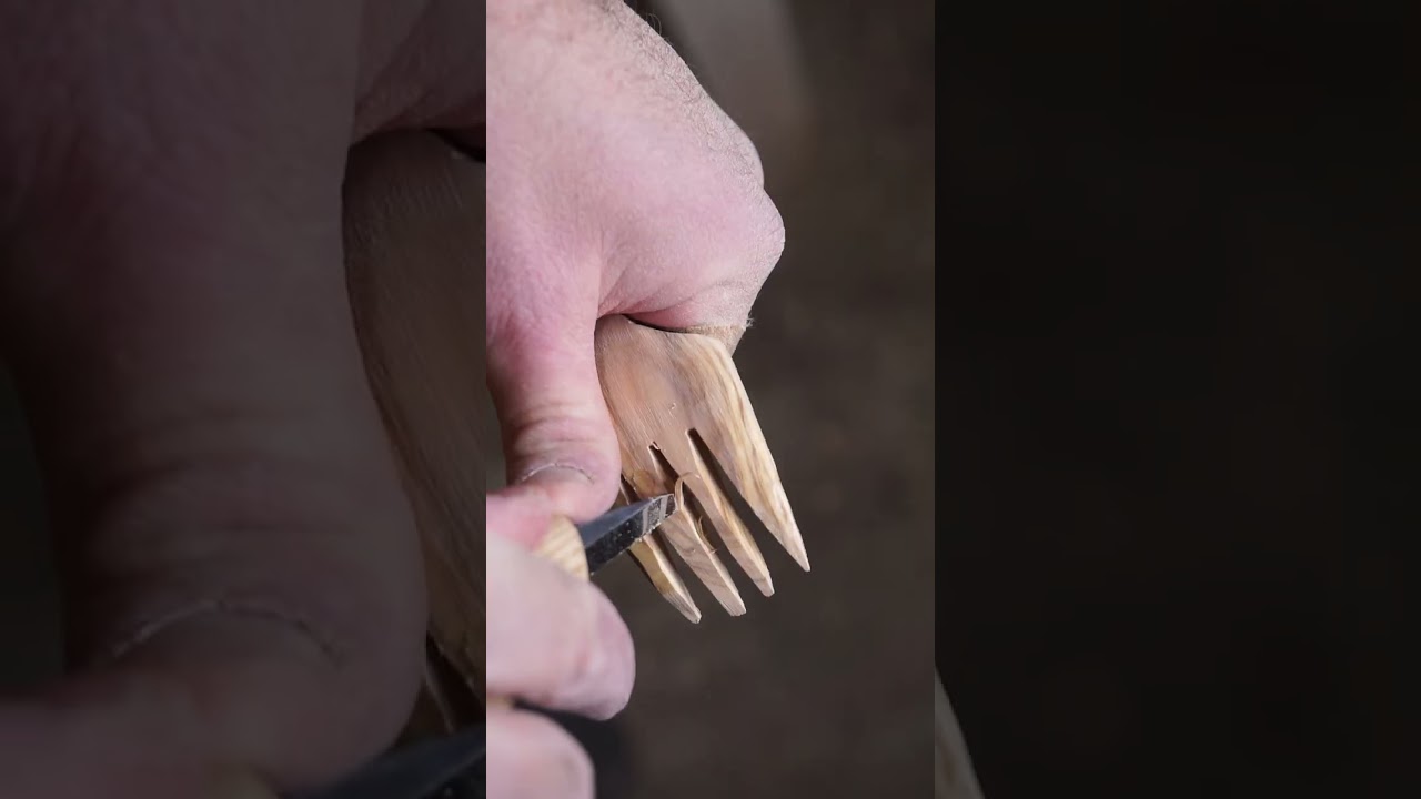 carving a spoon and fork out of olive wood
