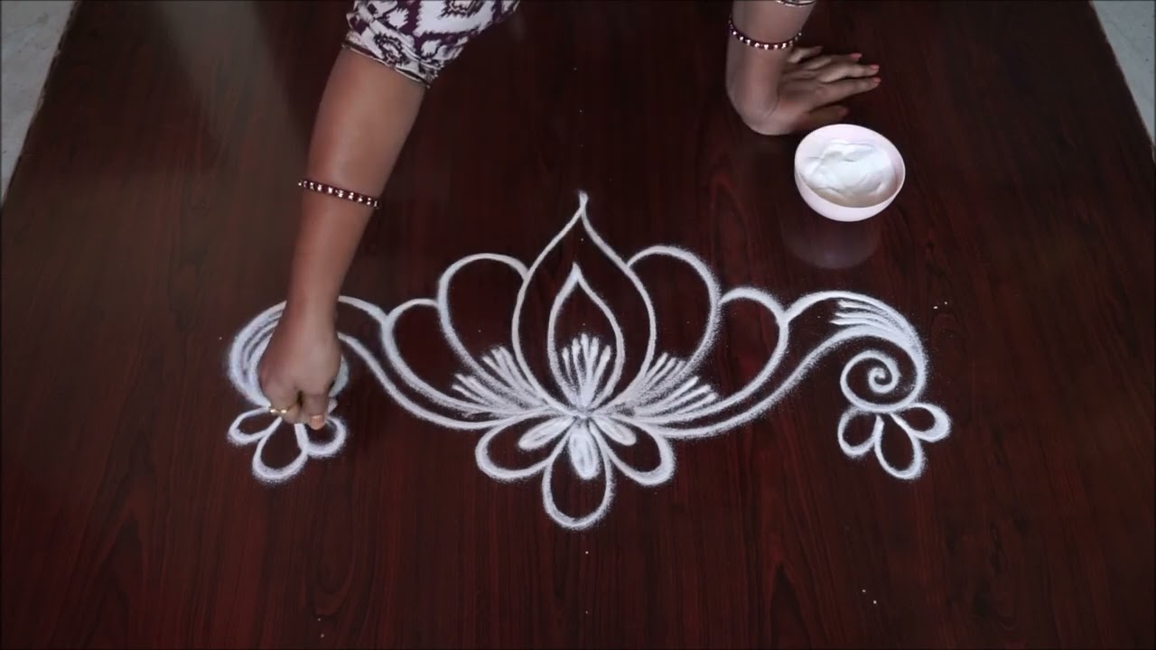 Simple rangoli design #rangoli #muggulu #easyrangoli #kolam #rangolidesigns #howtodraw