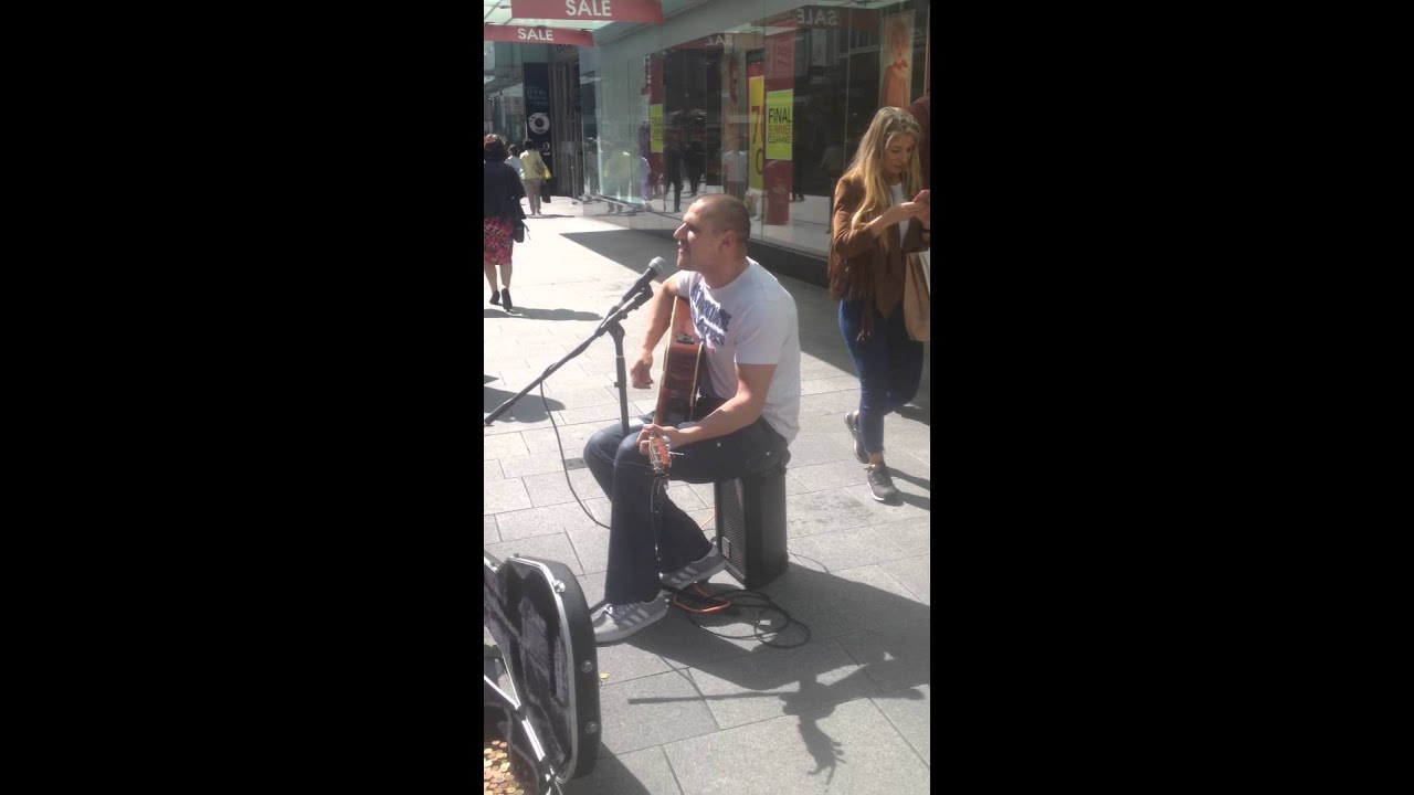 Dublin busker singing go on home British soldiers in dublin