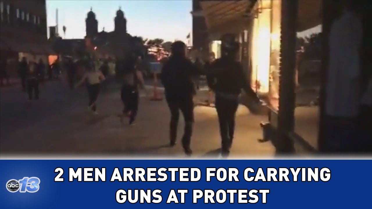 2 men arrested for carrying guns during Asheville protest