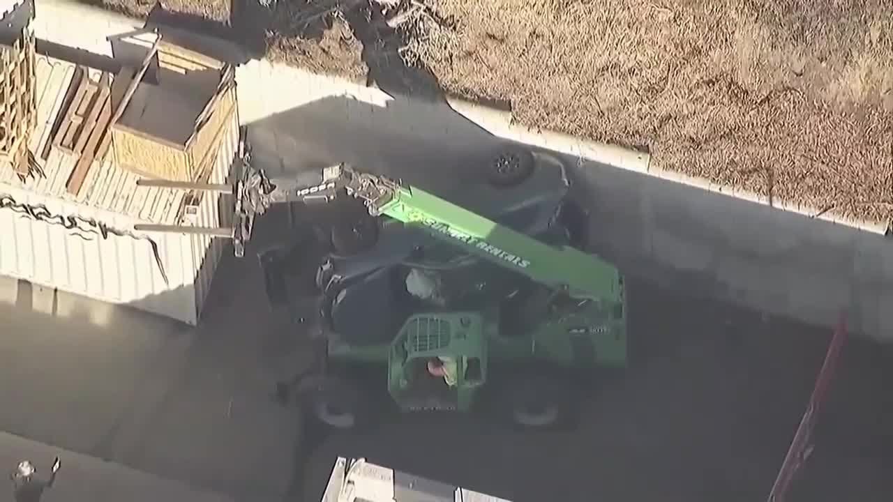 Police chase in National City ends with car stuck between forklift and wall