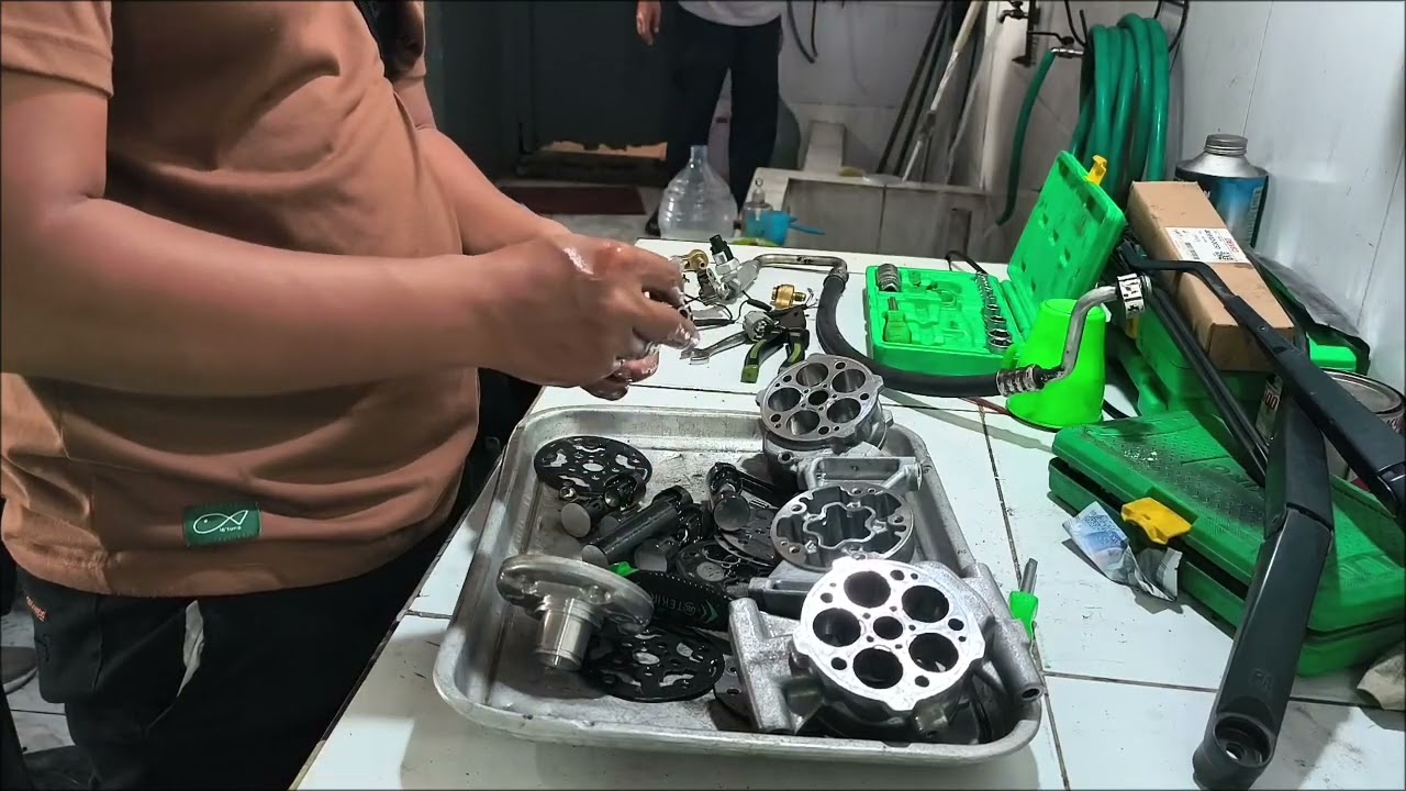 Perbaikan kompresor ac mobil bunyi ngorok