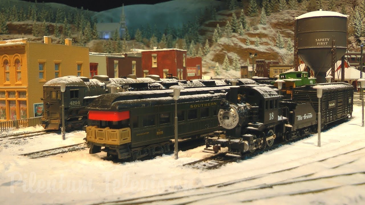 Model Railway Layout both in Summer and in Winter Landscape in HO scale