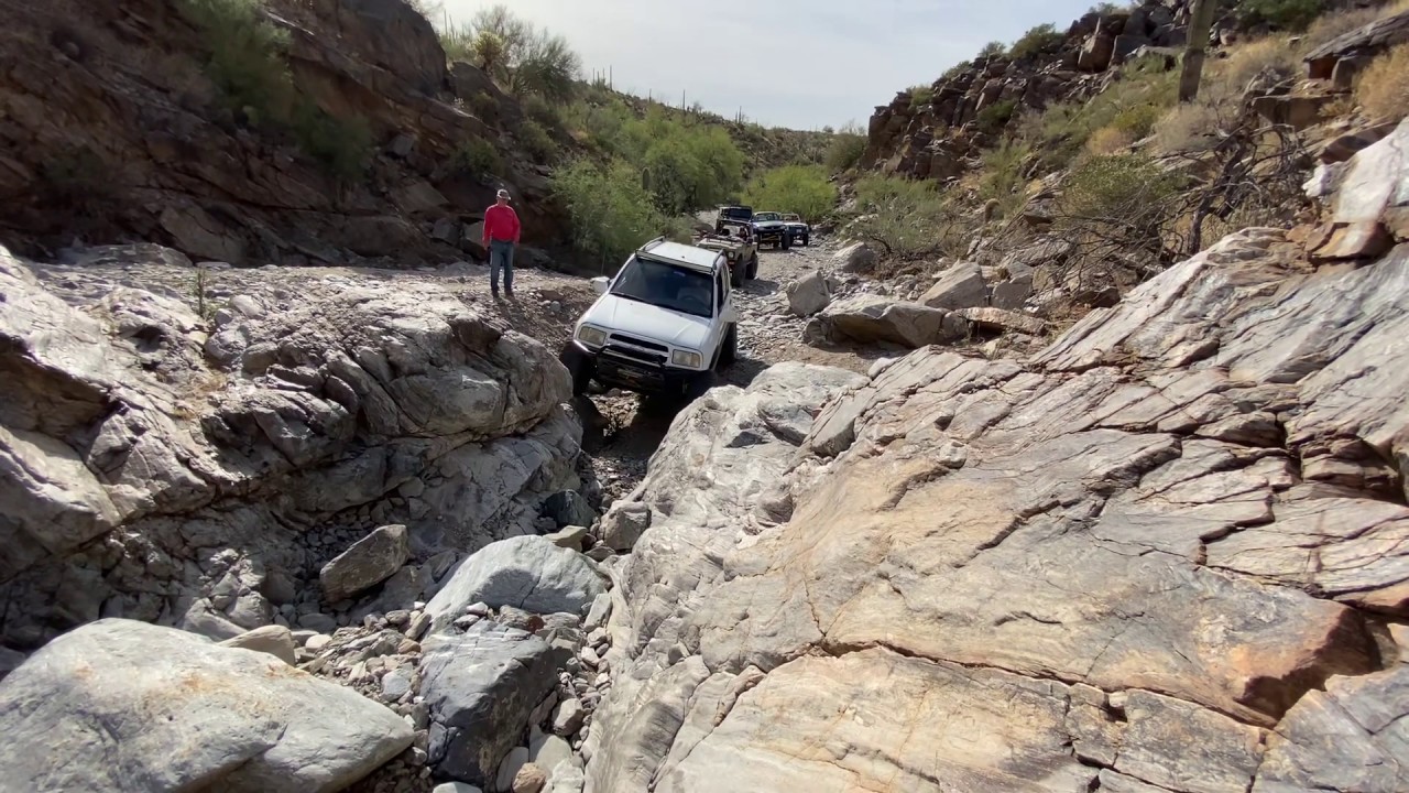 Chevy Tracker/Suzuki Grand Vitara climbing firehole on Woodpecker Trail