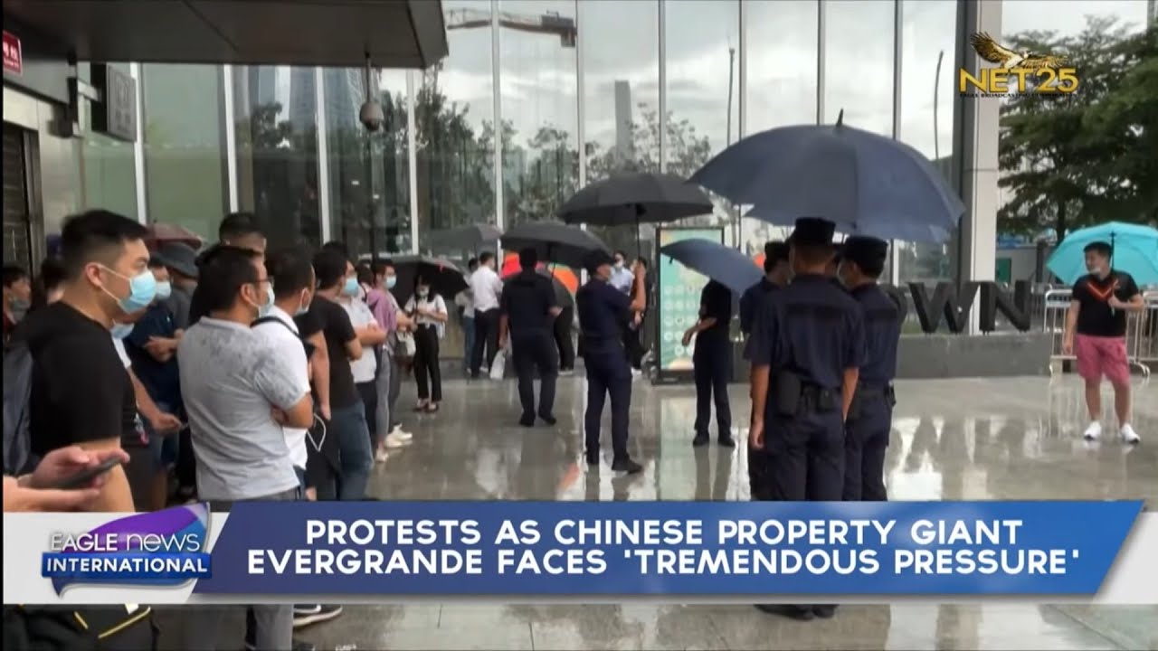 Protests as Chinese property giant Evergrande faces 'tremendous pressure'