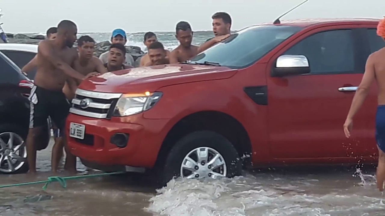 TROLLER DESATOLANDO CARROS NA PRAIA RAPOSA-MA - (seguencia)