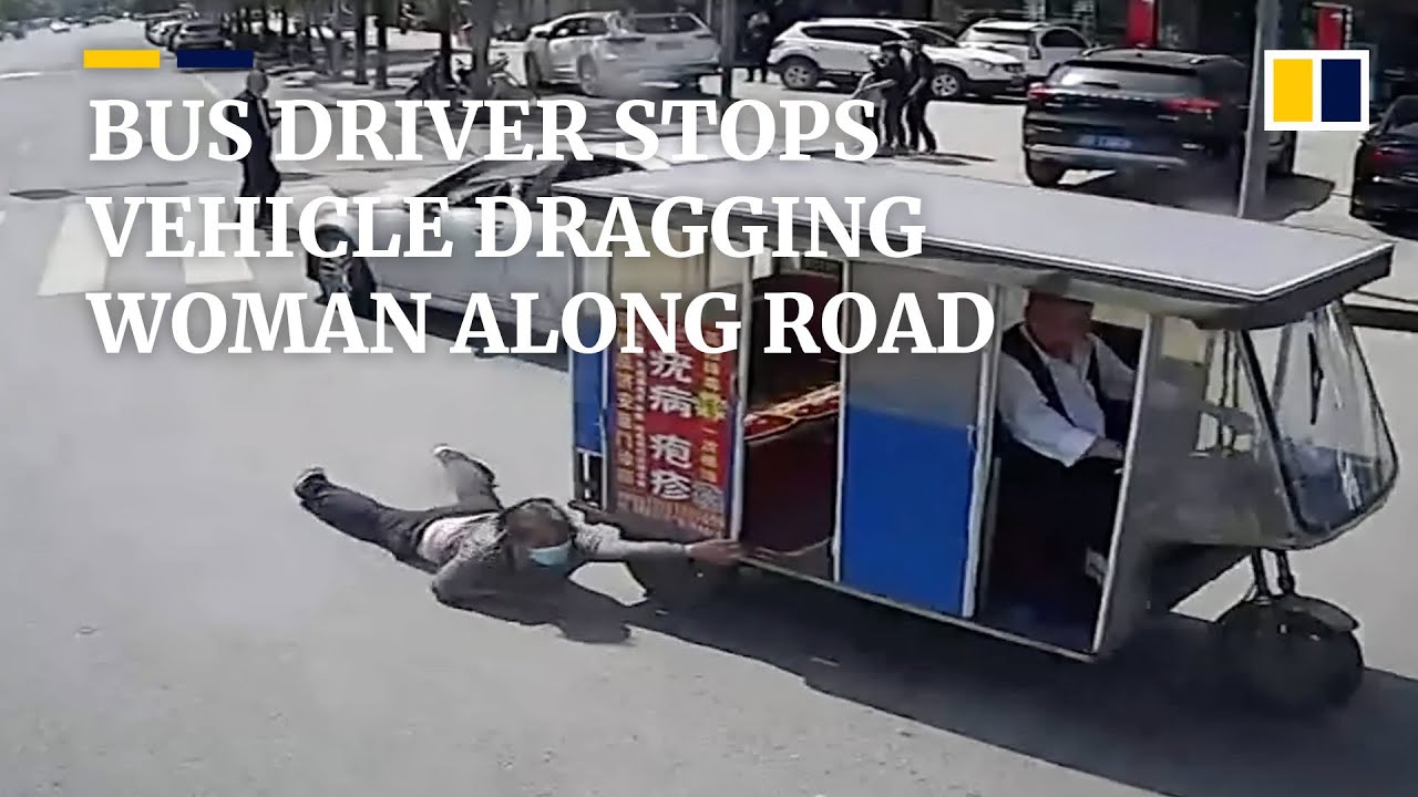 Heroic bus driver stops three-wheeler dragging woman along road in China