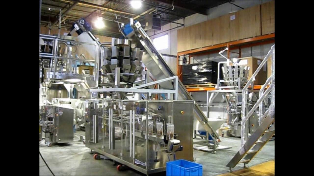 PrimoCombi® multihead weigher dispensing tobacco into pre made pouches