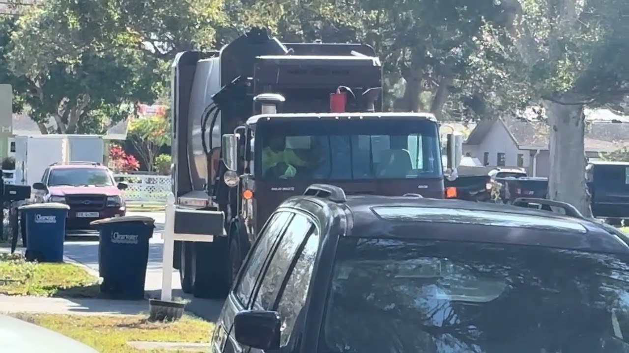 City garbage truck pick up