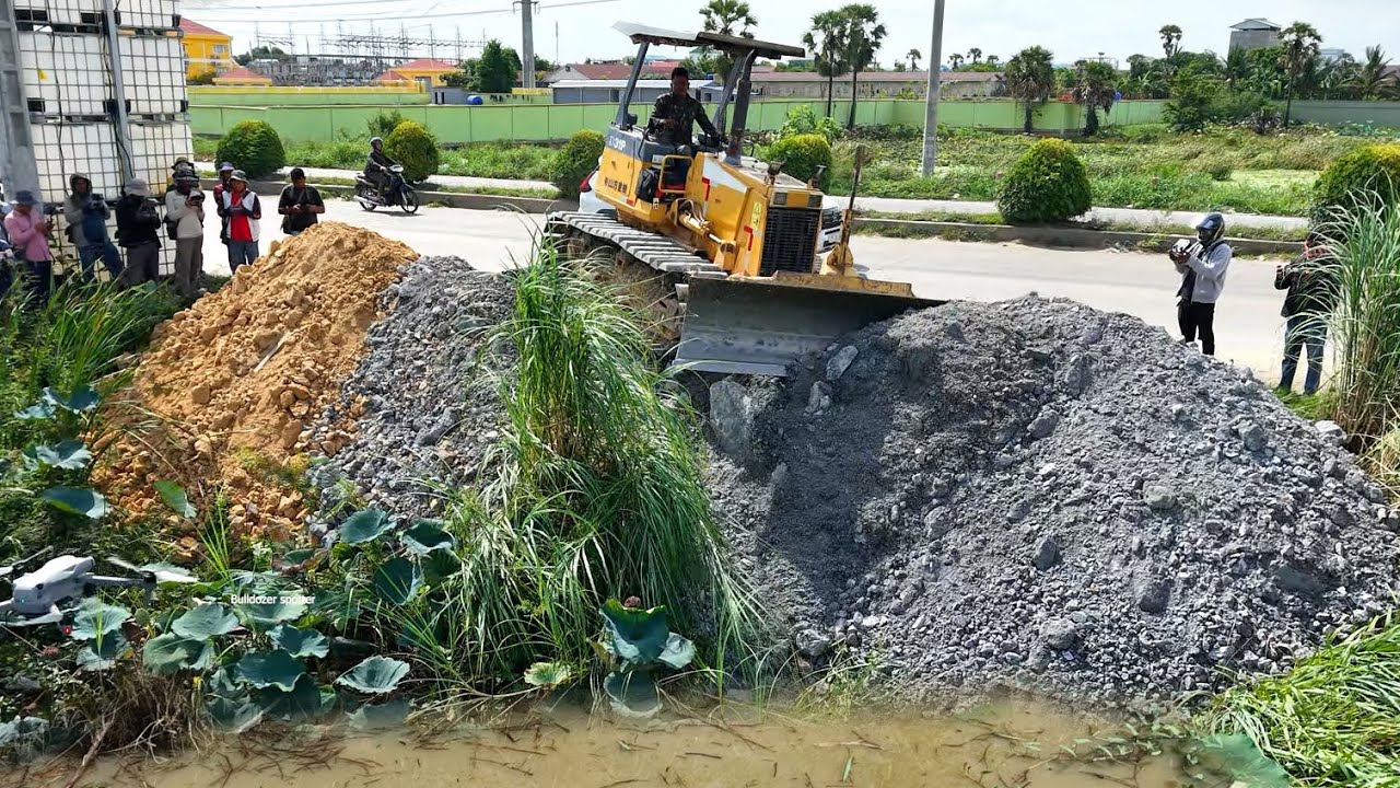 New Project landfilling flooded By Using Bulldozer Komatsu D31P working push soil with dump truck 5T