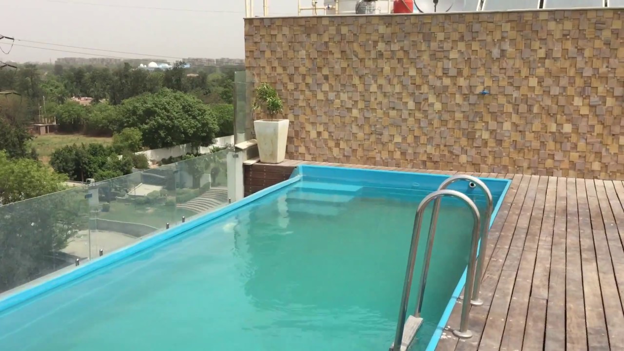 FRP swimming pool with infinity pool on roof top at Delhi.