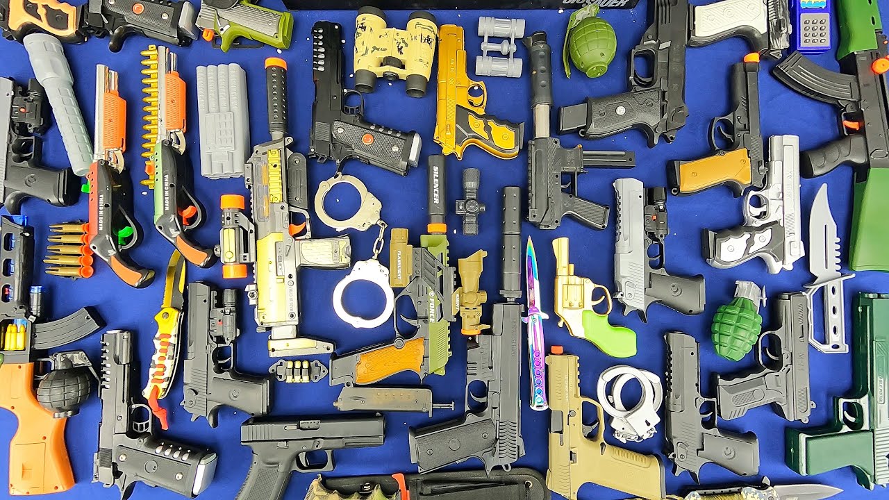 toy gun types collection / equipment & ammunition such as handcuffs, knives