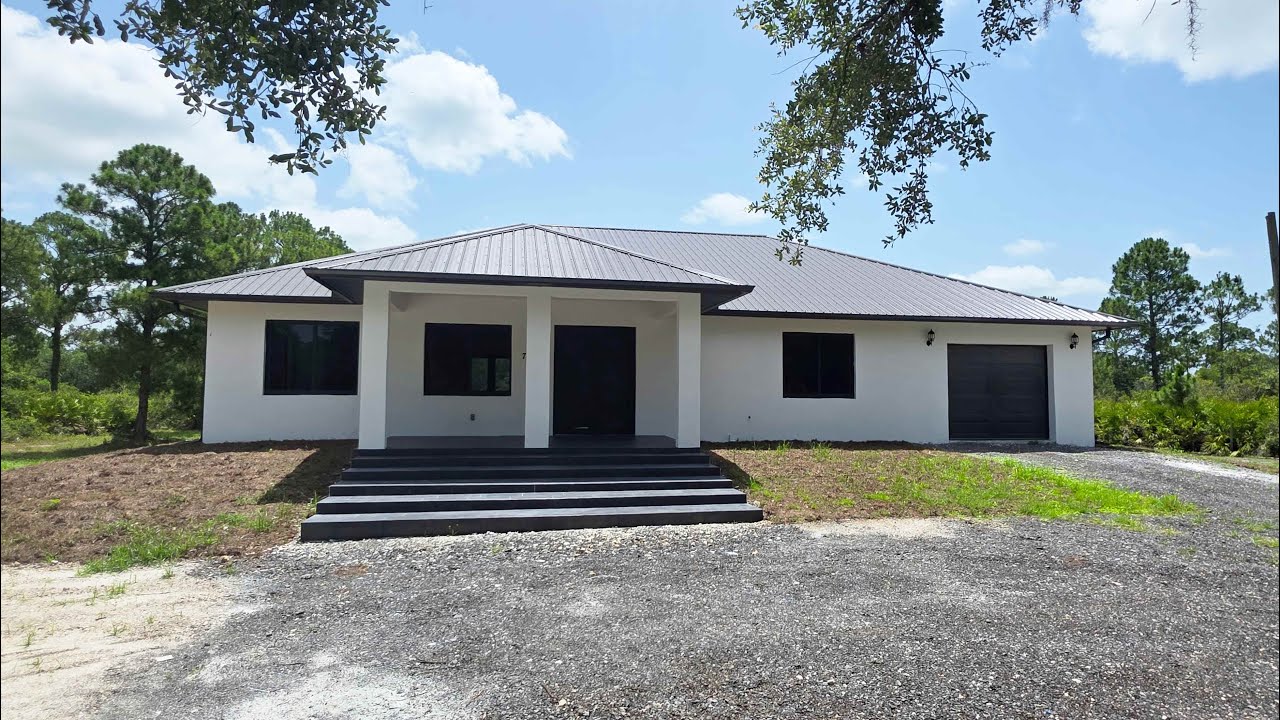 Stunning, brand new home for Sale 1.25-acre lot in MONTURA RANCH FL.