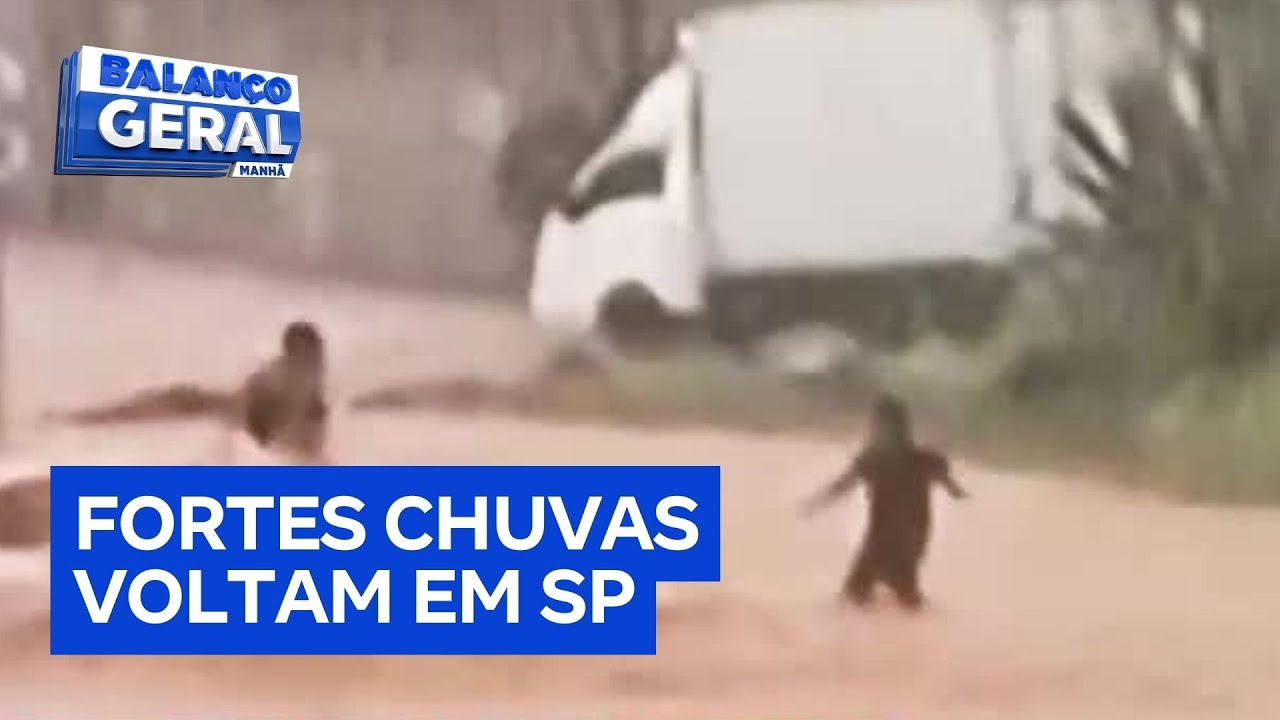 Forte chuva deixa mulher ilhada sobre carro e provoca alagamentos na Grande São Paulo