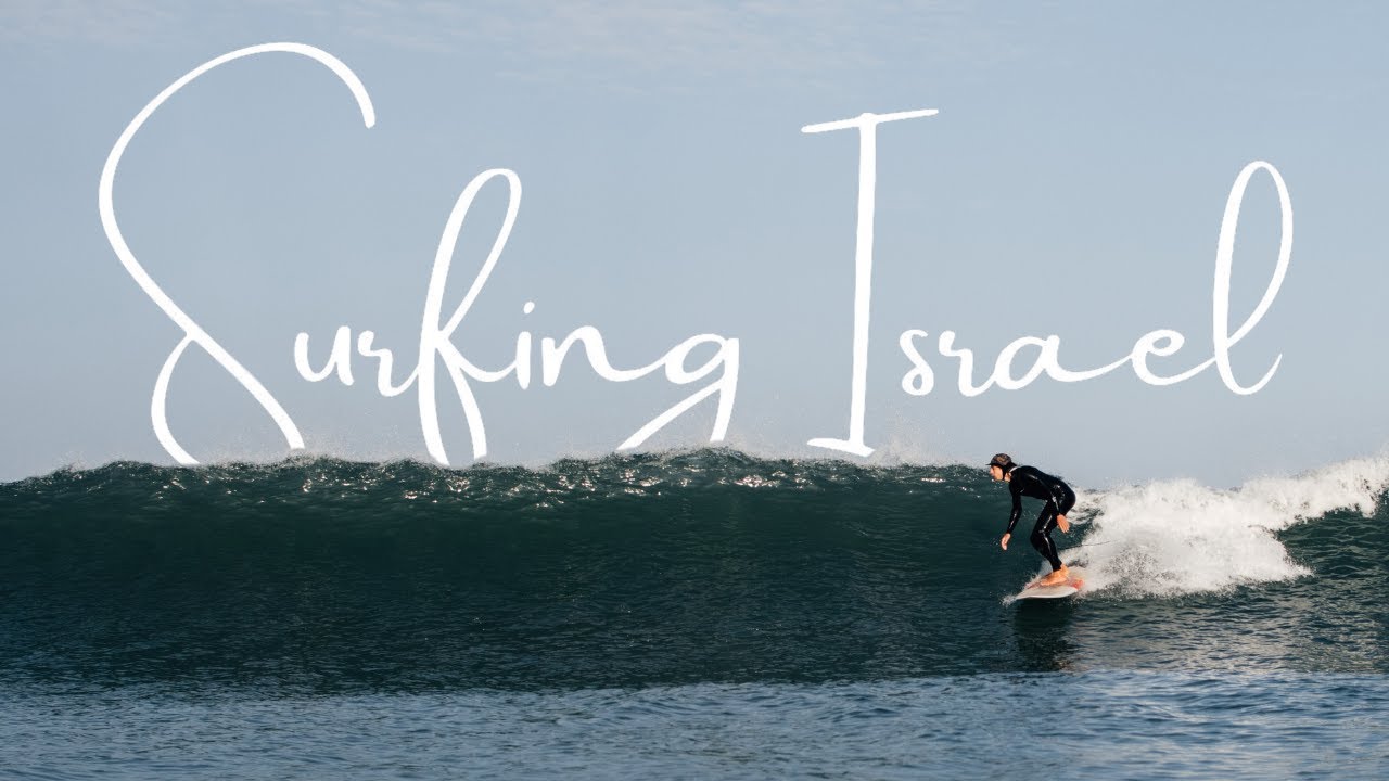 A perfect glassy sunrise surf in Tel Aviv, Israel