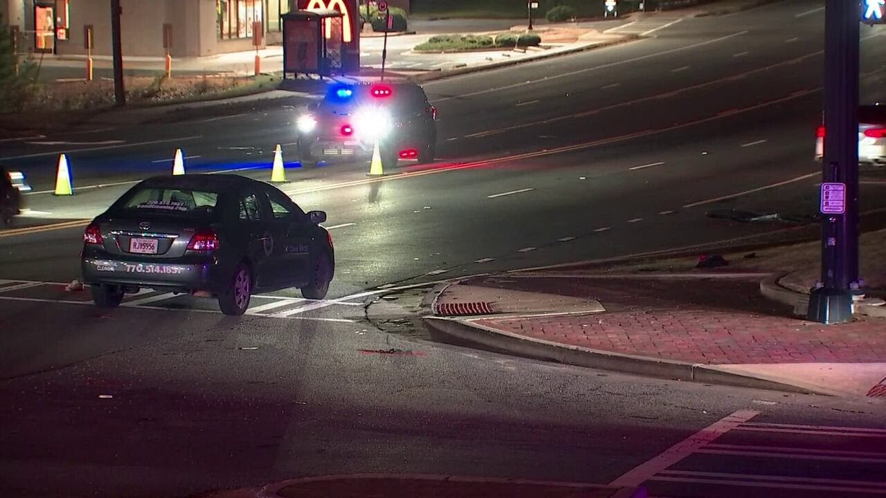 Collision between vehicle, bicyclist partially shuts down intersection in Marietta