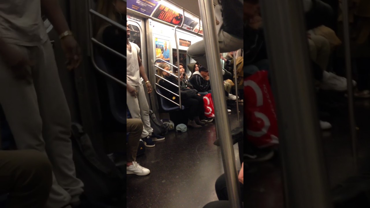 Crazy subway pole dancers !!!! NYC