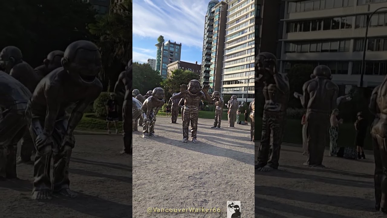 Laughing people statues at English Bay