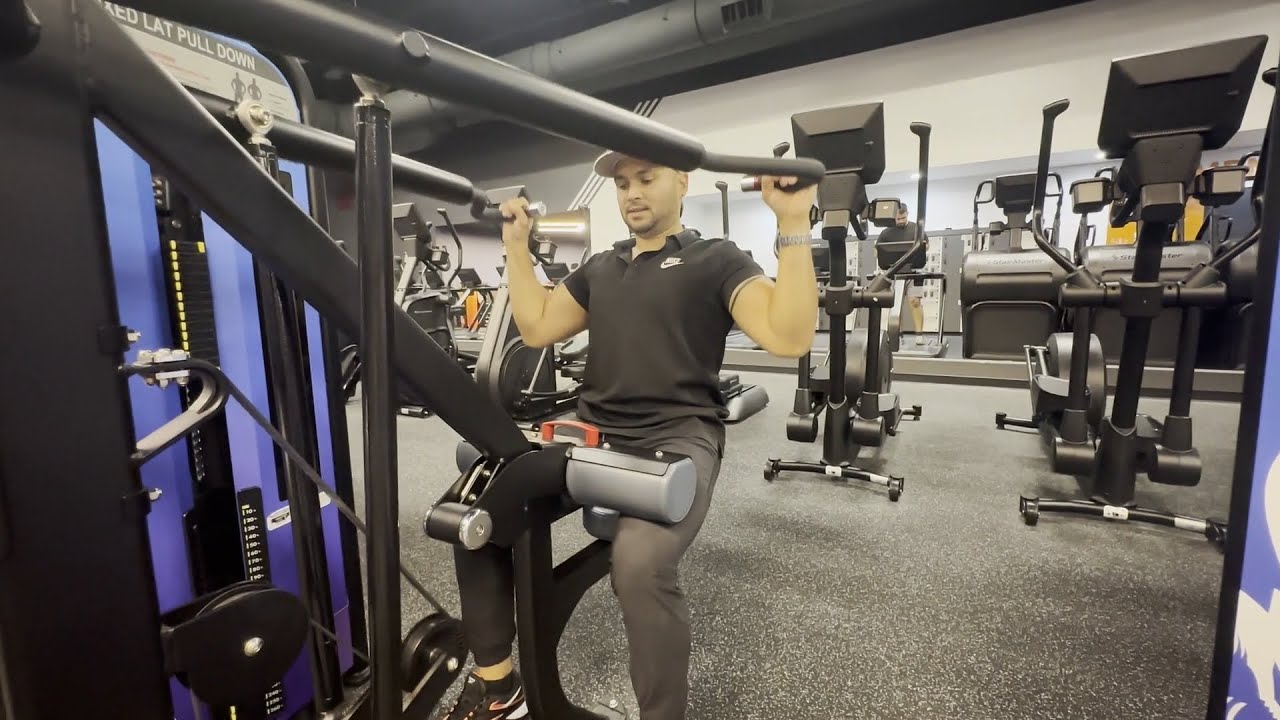 how to use the nautilus impact fixed lat pulldown machine