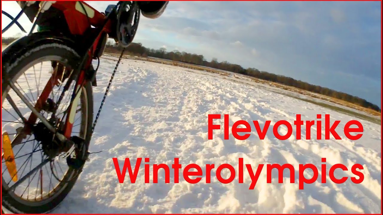 Cycling a Flevotrike recumbent through snow and ice in the Netherlands.
