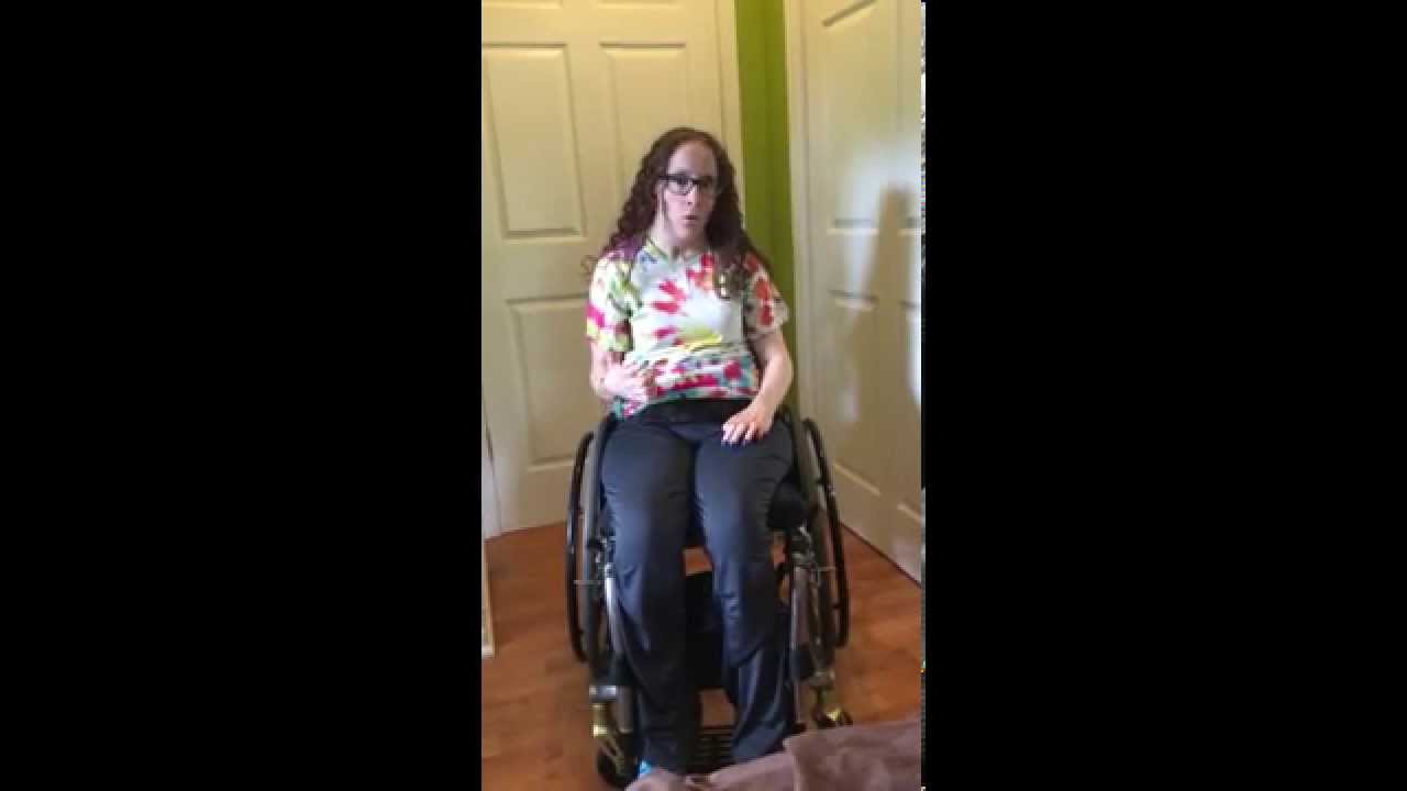 SCIVideoBlog.com - Quadriplegic Girl Picking Items Up Off The Floor