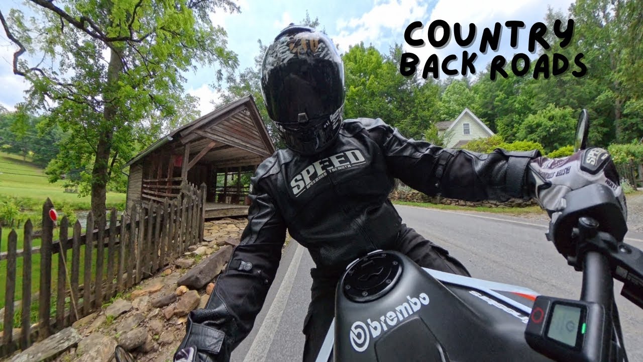 Motorcycle riding some country roads.