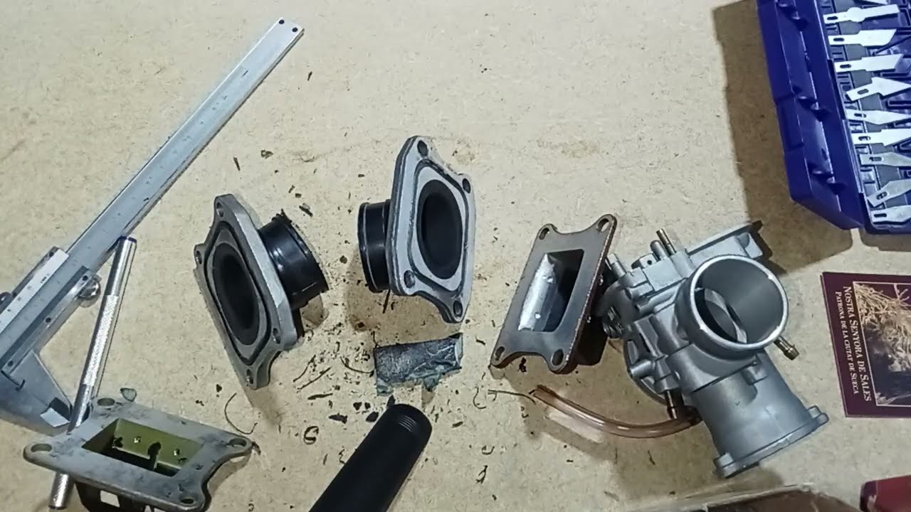 2º video, repasando tomas de admisión, carburador a caja de láminas, toberas de Honda Cr 80/85.