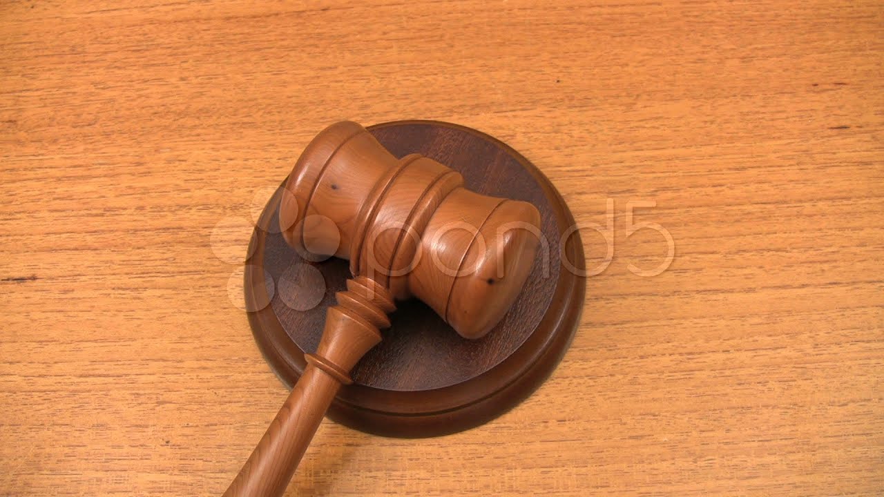 A Gavel Strikes A Sound Block.. Stock Footage