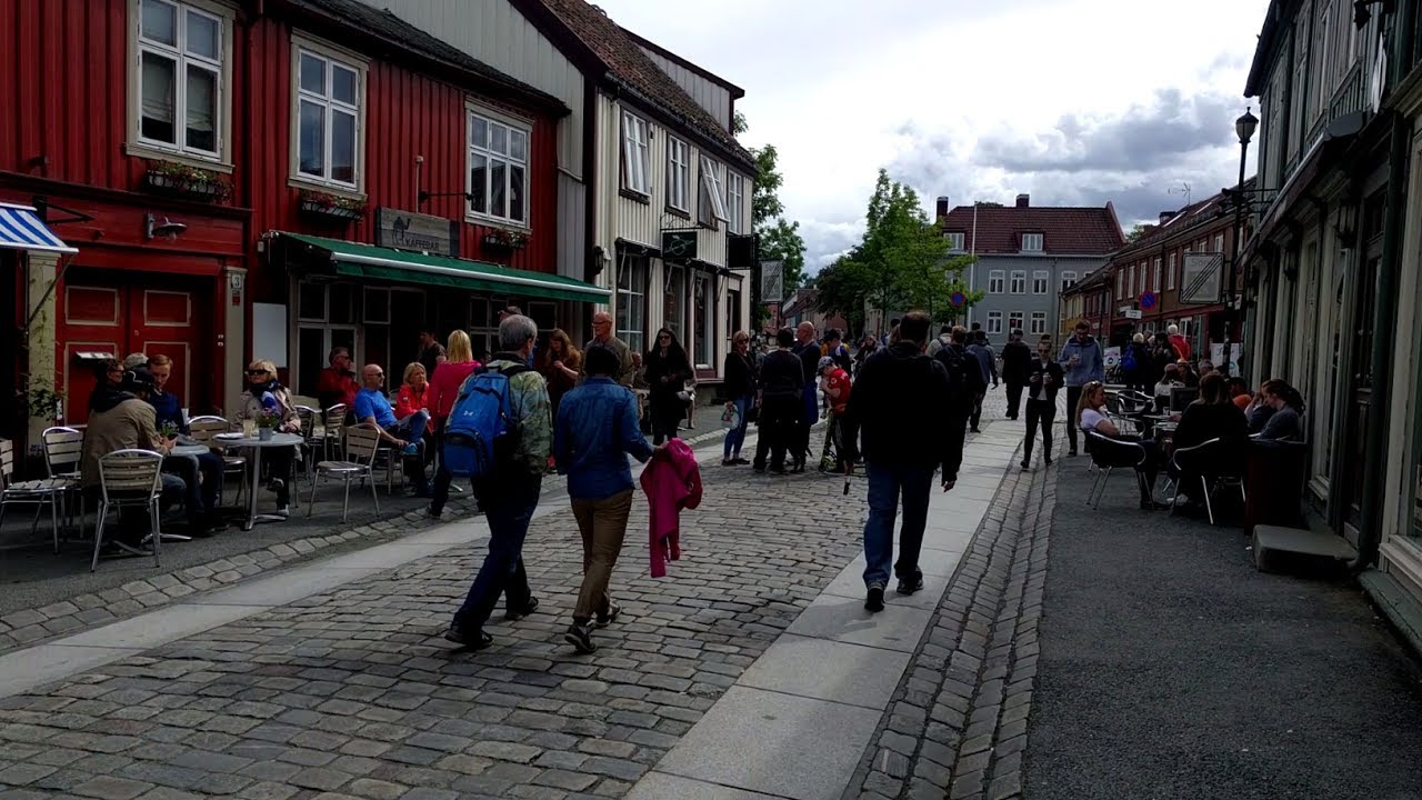 Walking through the historic Bakklandet neighborhood in Trondheim, Norway