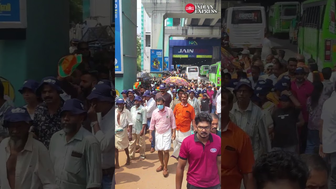 Party workers who arrived to attend NDA convention, lead by PM Modi, wait outside JLN stadium, Kochi