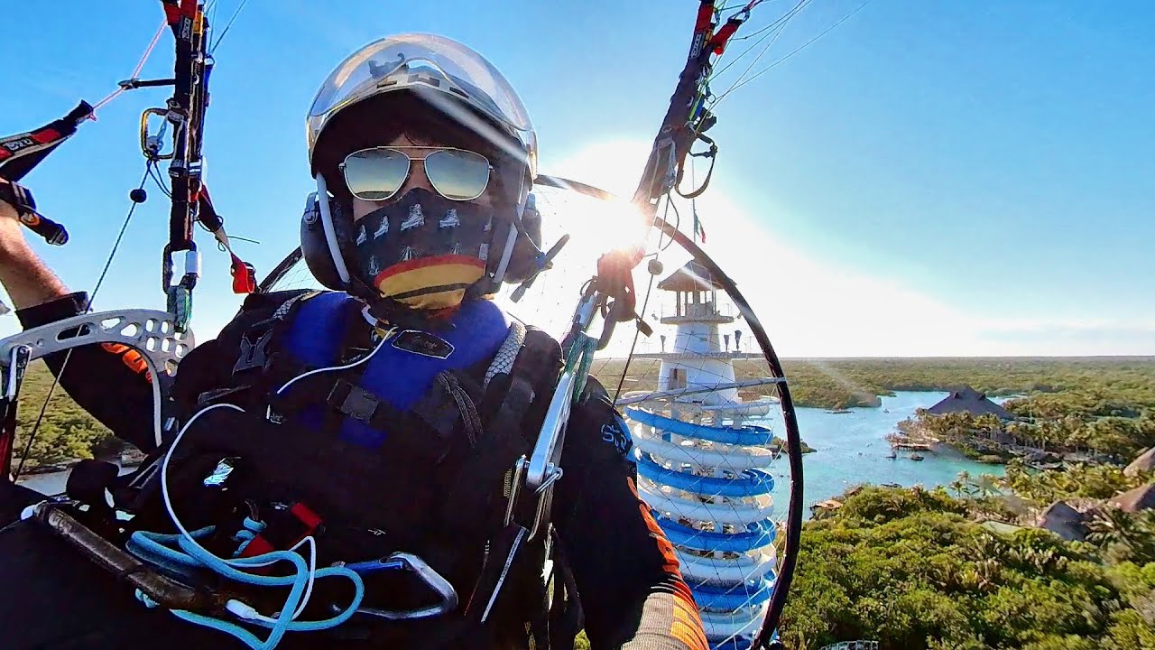 Flying south on a Paramotor, on the way back from Xpuha to Xel-Ha landing in Bahia Principe beach.