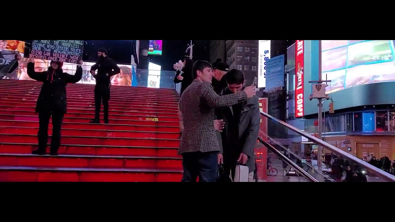 PROTESTERS TAKE OVER TIMES SQUARE RED STAIRS!!! NEW YORK CITY!!!