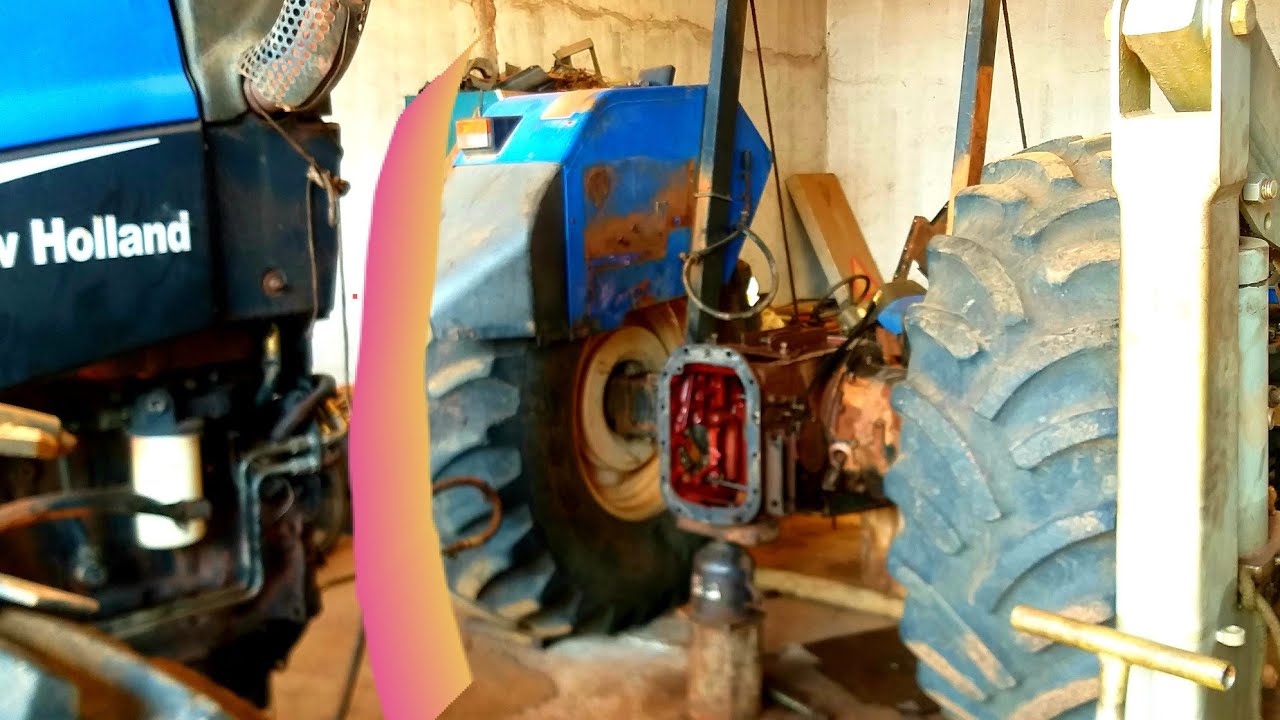 Câmbio trator new holland aberto. Defeitos nas engrenagens do new holland .