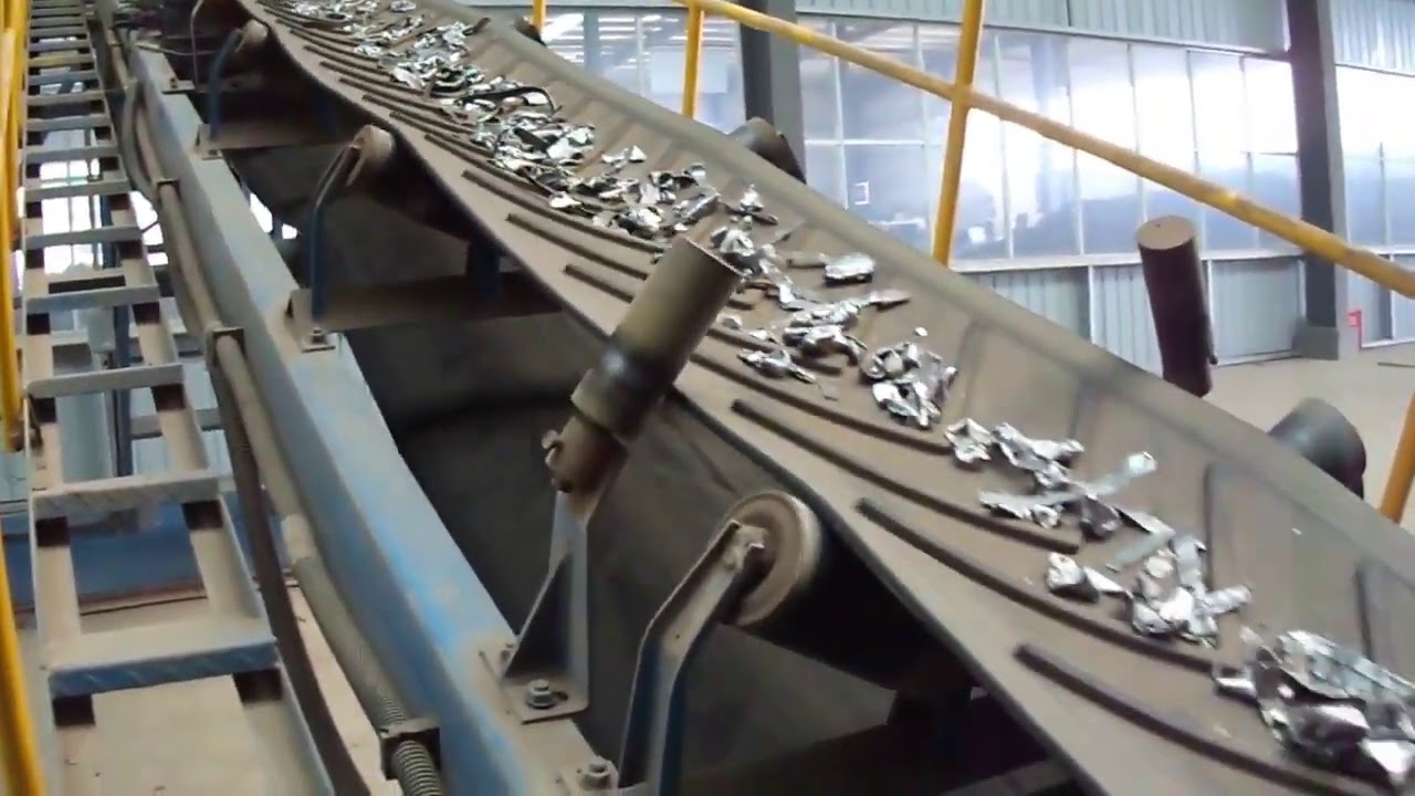 MOV00088 EIDAL METAL SHREDDING DISCHARGE FROM VERTICAL GRINDER LIGHT DENSITY